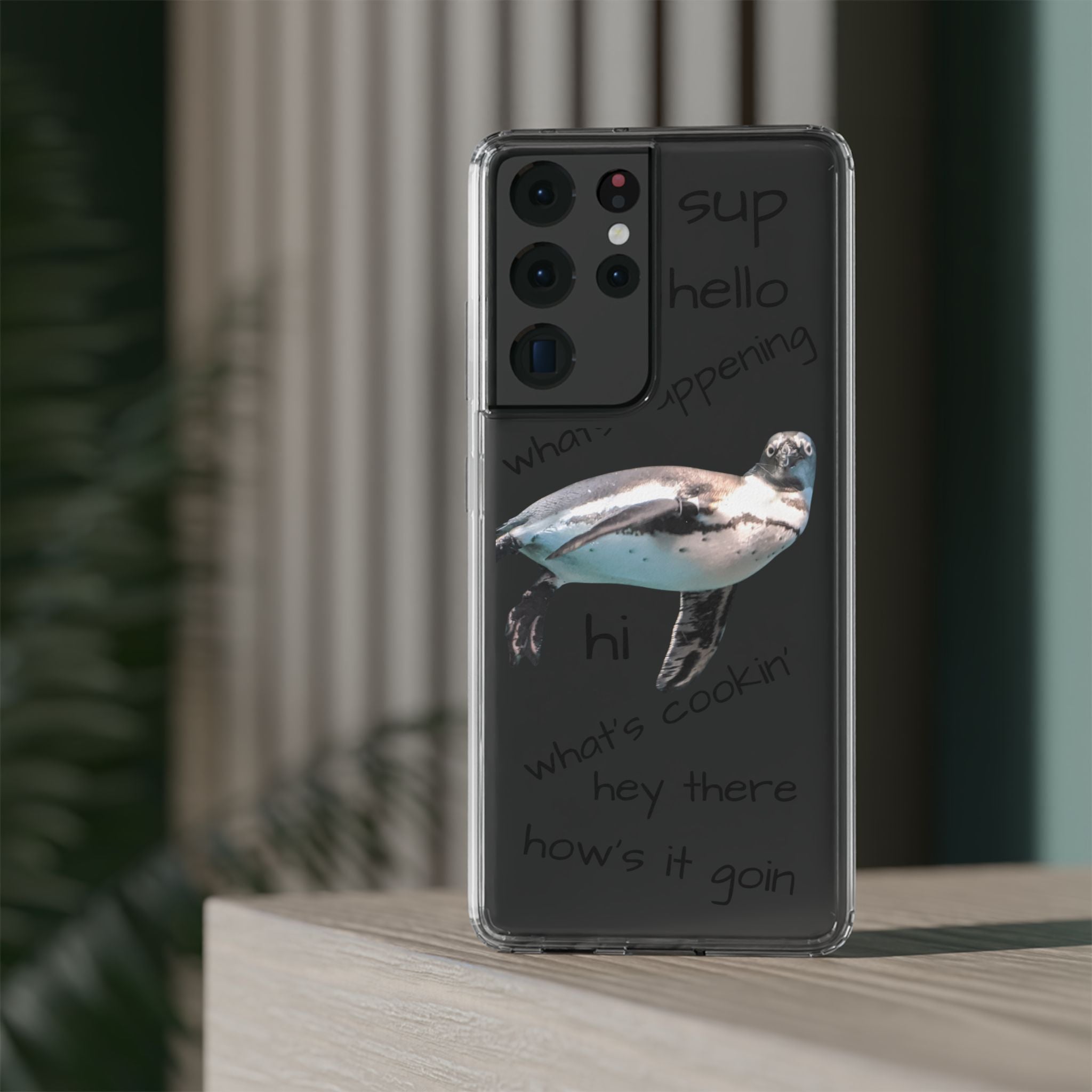 Clear Penguin Phone Case — Cute Floating Penguin with Casual Greetings, Clear Impact‑Resistant iPhone Case